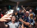 New Vancouver Whitecaps player Thomas Muller smiles after arriving from Germany at Vancouver International Airport in Richmond, B.C., on Wednesday, August 13, 2025.