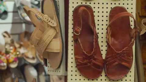Jesús Méndez/EPA/Shutterstock Traditional huaraches are displayed at a market in Oaxaca, Mexico