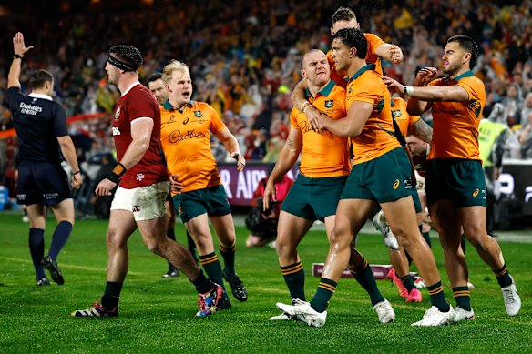 Dylan Pietsch of the Wallabies celebrates after scoring a try