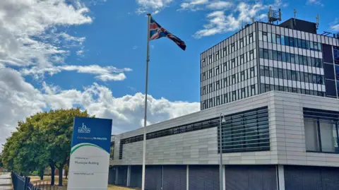 LDRS The union flag being flown at Halton Borough Council HQ in Widnes. 