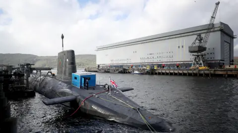 PA Media File photo dated 29/09/17 of the Vanguard-class nuclear deterrent submarine HMS Vengeance at HM Naval Base Clyde, Faslane. 