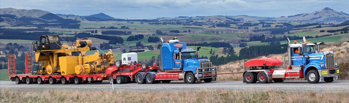 Giant dump trucks back where they belong