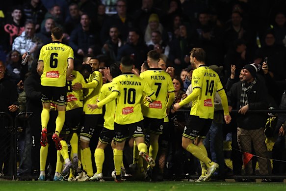 Heidelberg United celebrate a goal.
