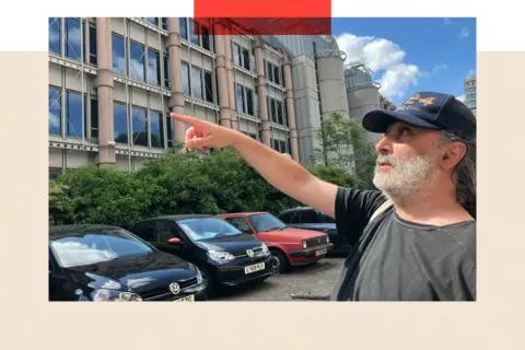 Mark Nygate pointing at the proposed development