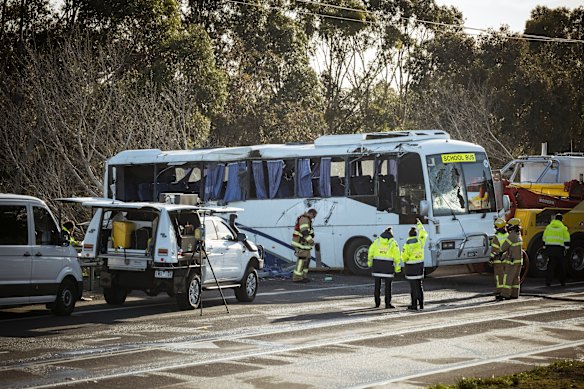 The bus has been lifted back on to its wheels.