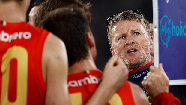 MELBOURNE, AUSTRALIA - AUGUST 09: Damien Hardwick, Senior Coach of the Suns addresses his players during the 2025 AFL Round 22 match between the Carlton Blues and the Gold Coast Suns at Marvel Stadium on August 9, 2025 in Melbourne, Australia. (Photo by Michael Willson/AFL Photos via Getty Images)
