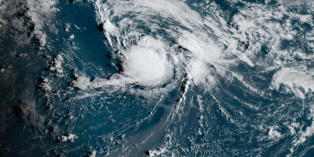 Tropical Storm Fernand strengthens east of Bermuda as Invest 99L development chances drop