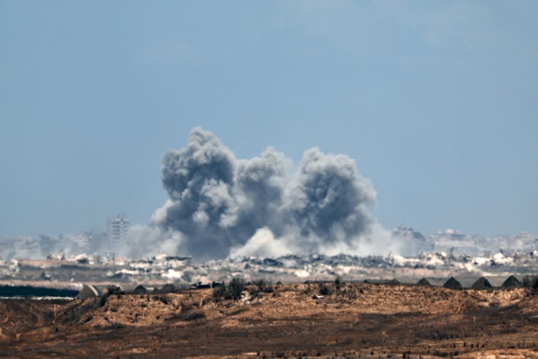 Long-distance view of Israeli airstrikes being conducted against northernm Gaza.