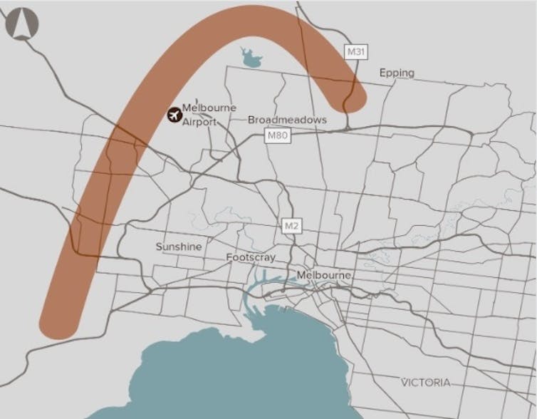 A map of Melbourne with a red band showing a proposed freeway route.
