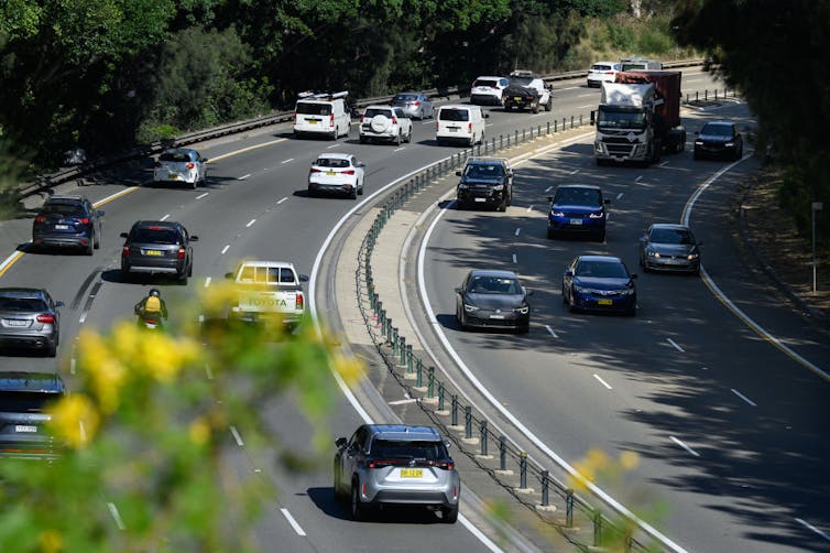 cars and trucks on multi-lane freeway