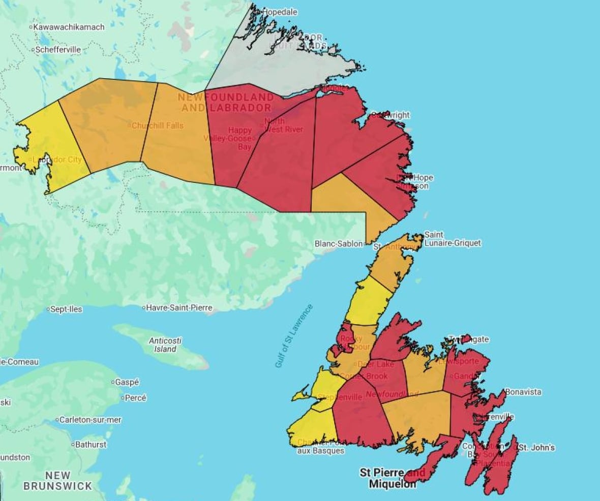 A map of Newfoundland and Labrador is divided into geographical regions. Much of the map is coloured red, indicating an extreme risk of fire. Other sections are orange and yellow, indicating high and very high fire risk.