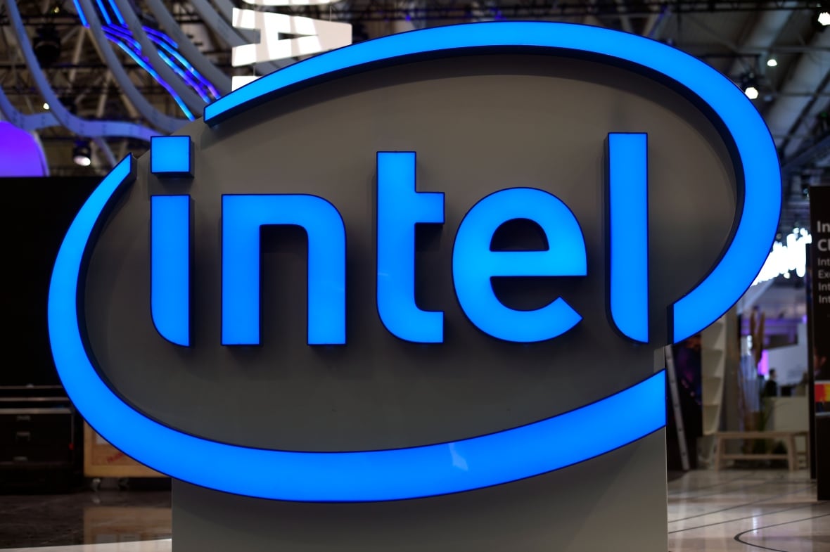 A blue logo for the company Intel is shown on display.