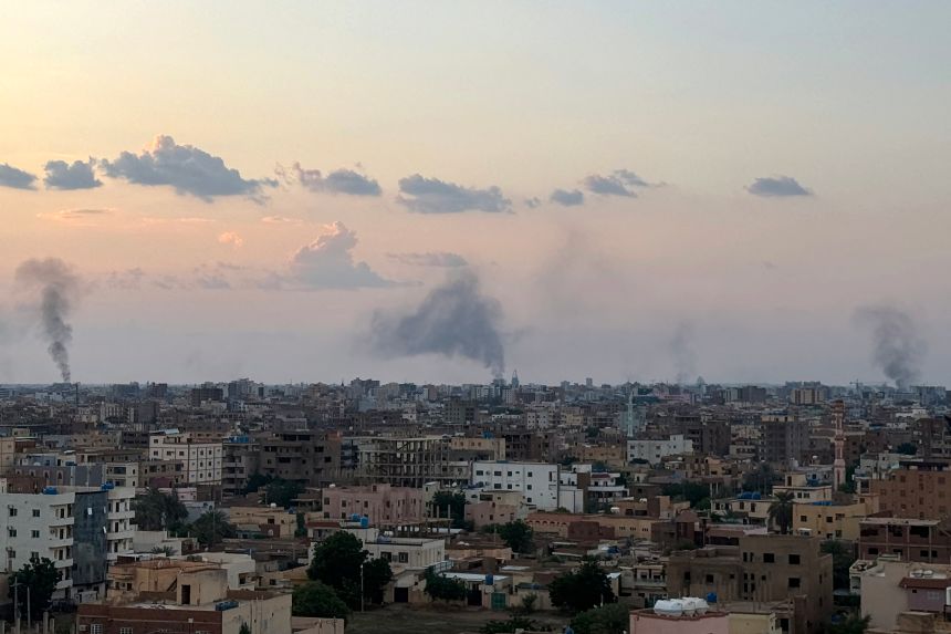 Smoke billows during air strikes in central Khartoum as the Sudanese army attacks positions held by the paramilitary Rapid Support Forces (RSF) throughout the Sudanese capital on October 12, 2024.