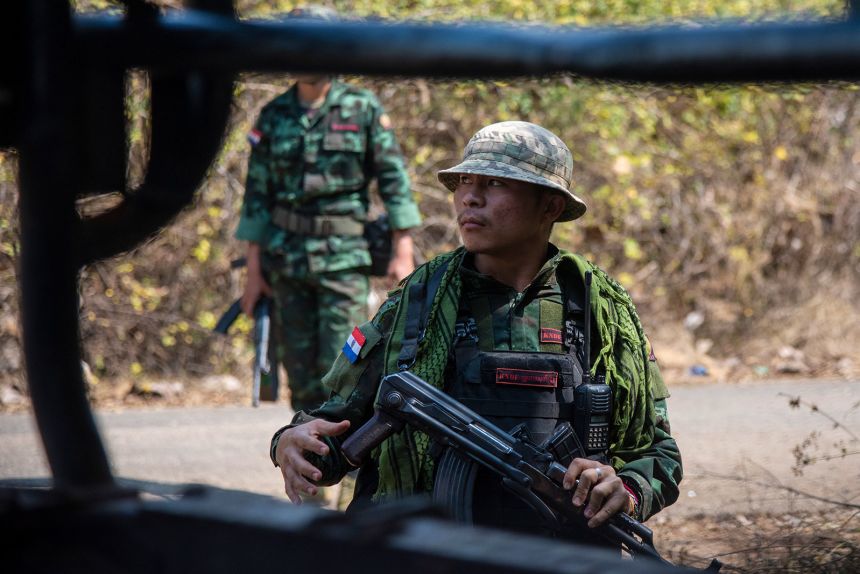 A soldier from the Karenni Nationalities Defence Force (KNDF), a main armed group fighting the military, walks to a reconnaissance mission.