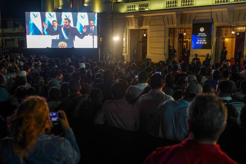 Supporters of Nayib Bukele watch a video feed as he delivers a State of the Union address at the National Palace in San Salvador, El Salvador, on June .