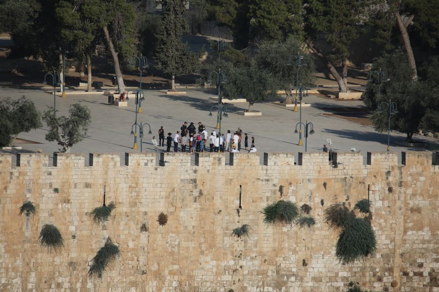 The worshippers prayed at the compound on Tisha B'Av, a Jewish day of mourning.