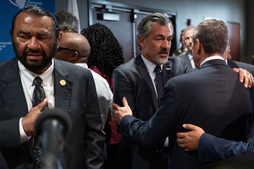 Rep. Al Green and State Rep. Ramón Romero attend a press conference of Texas House Democrats in Aurora, Illinois, on Tuesday.