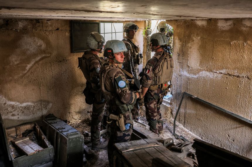 UNIFIL peacekeepers stand at a fortified artillery position formerly held by Iran-backed Hezbollah in el-Meri, southern Lebanon, on August 27, 2025.