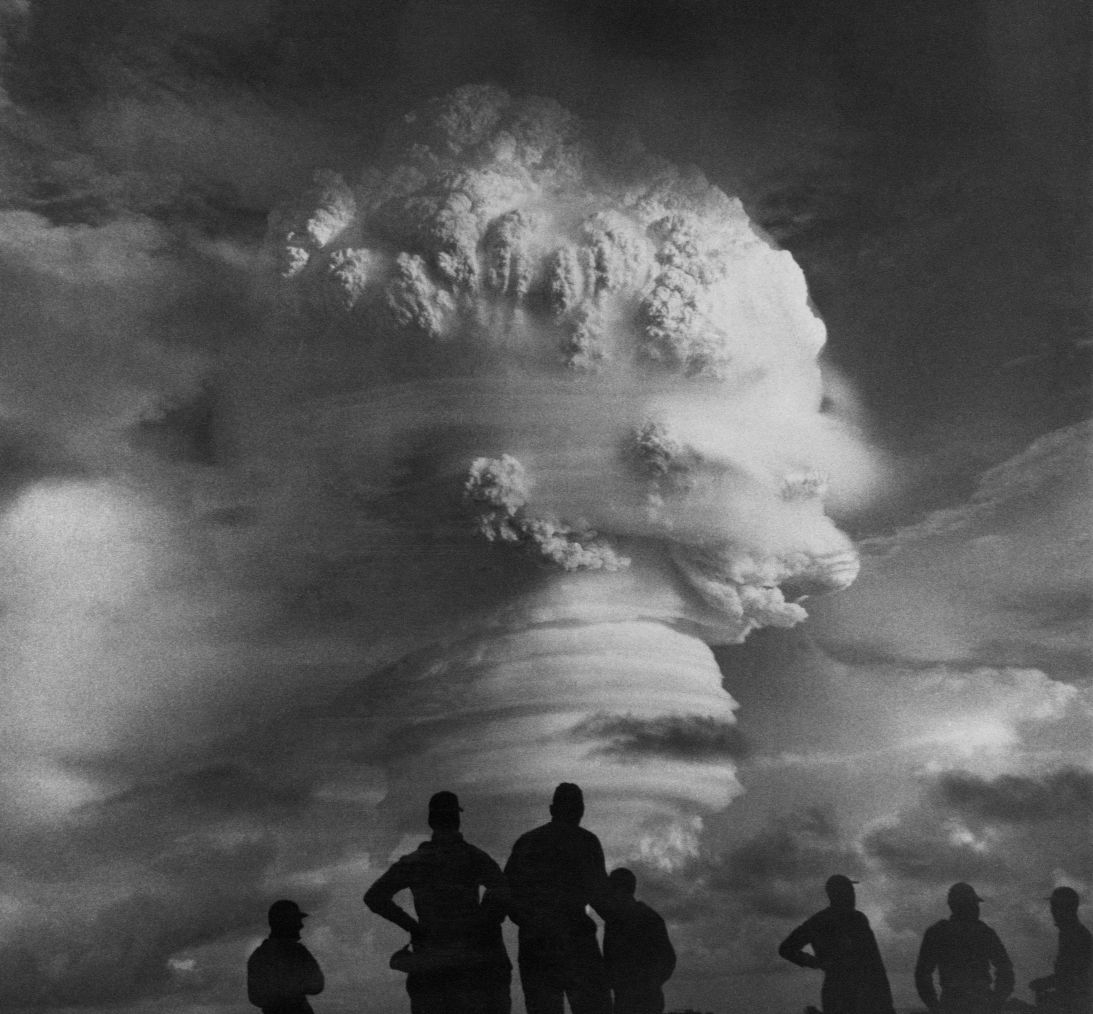 Soldiers watch the Operation Hardtack I thermonuclear detonation in 1958 near the Marshall Islands.