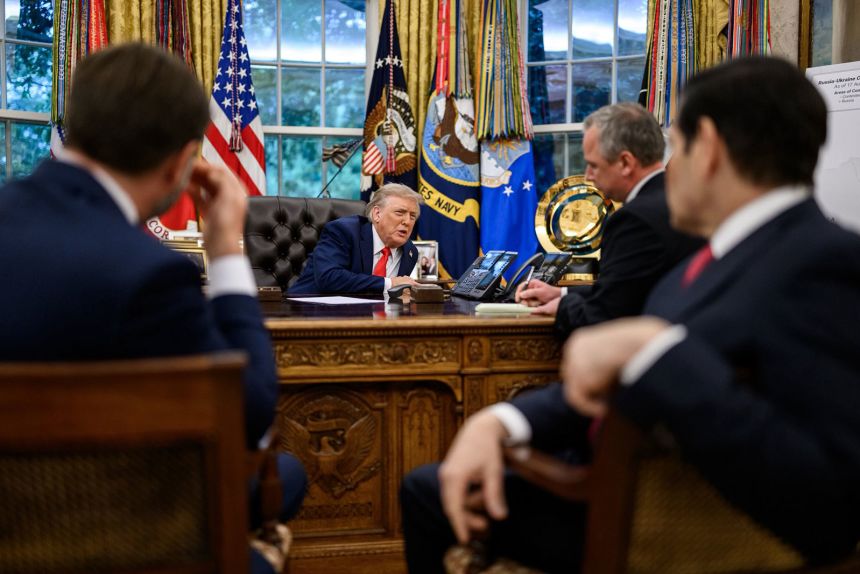 In a photo posted by the White House on X, US President Donald Trump speaks on the phone with Russian President Vladimir Putin on Monday, August 18.
