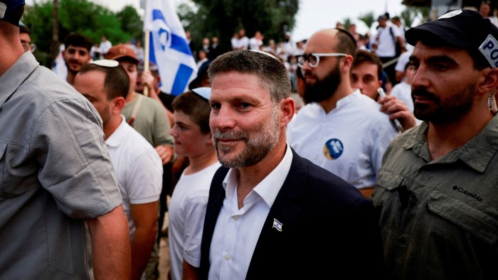 Israeli finance minister Bezalel Smotrich walks to visit the Damascus Gate in Jerusalem in May
