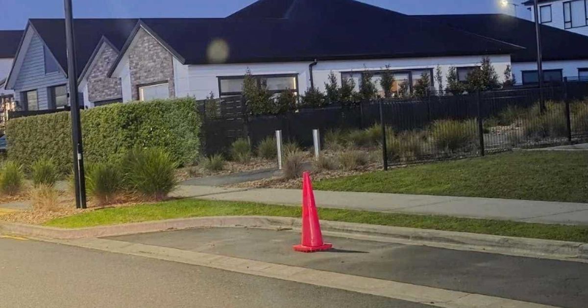 Family claims 'their' parking space with road cone