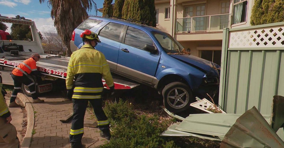 Out-of-control car smashes into yard where children had played moments earlier
