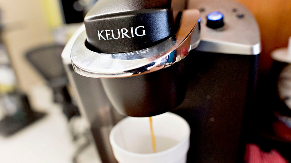 Keurig Green Mountain Inc. machine making coffee.