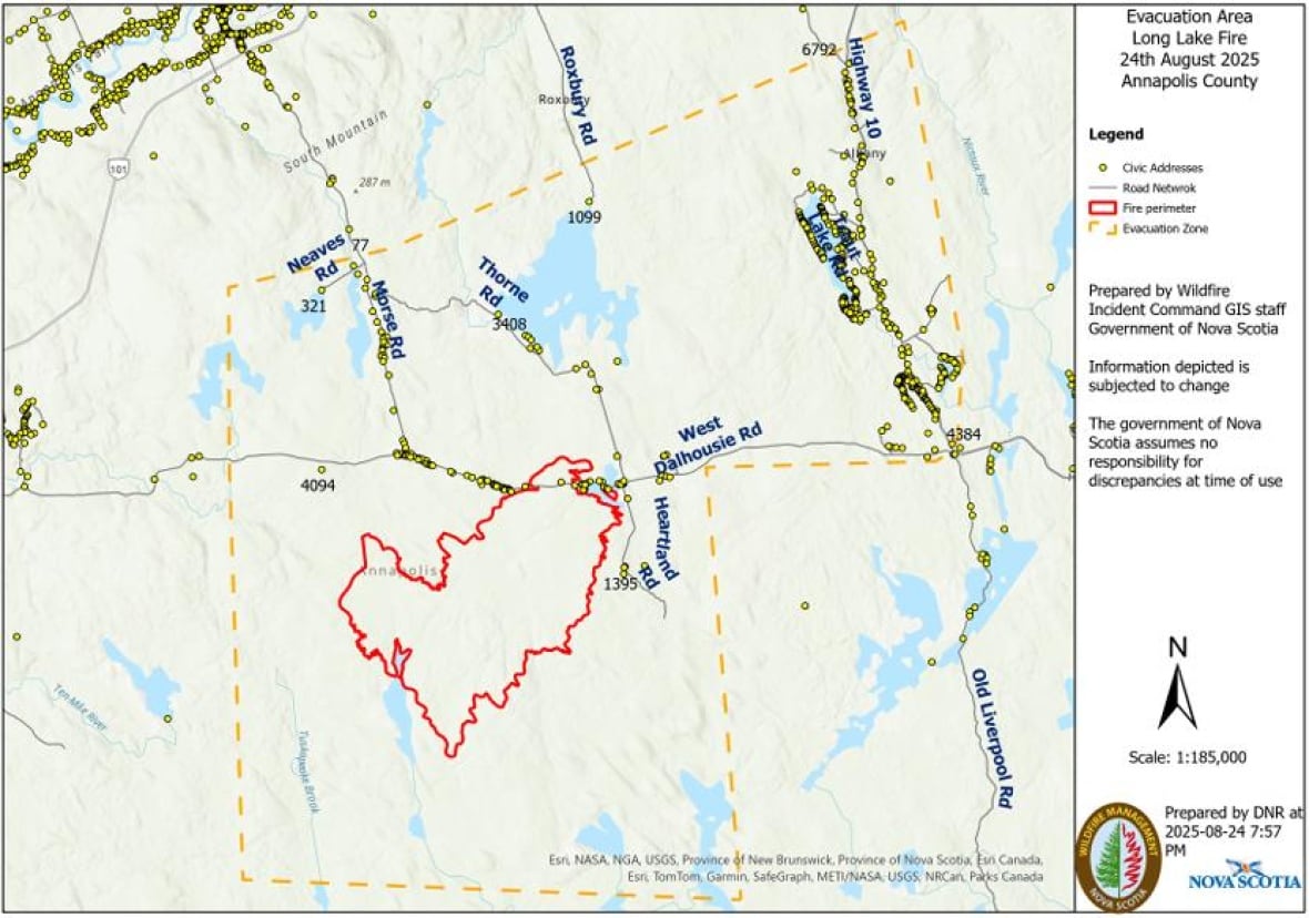 A map with a red line indicating the fire perimeter and a yellow line indicating the evacuation zone.