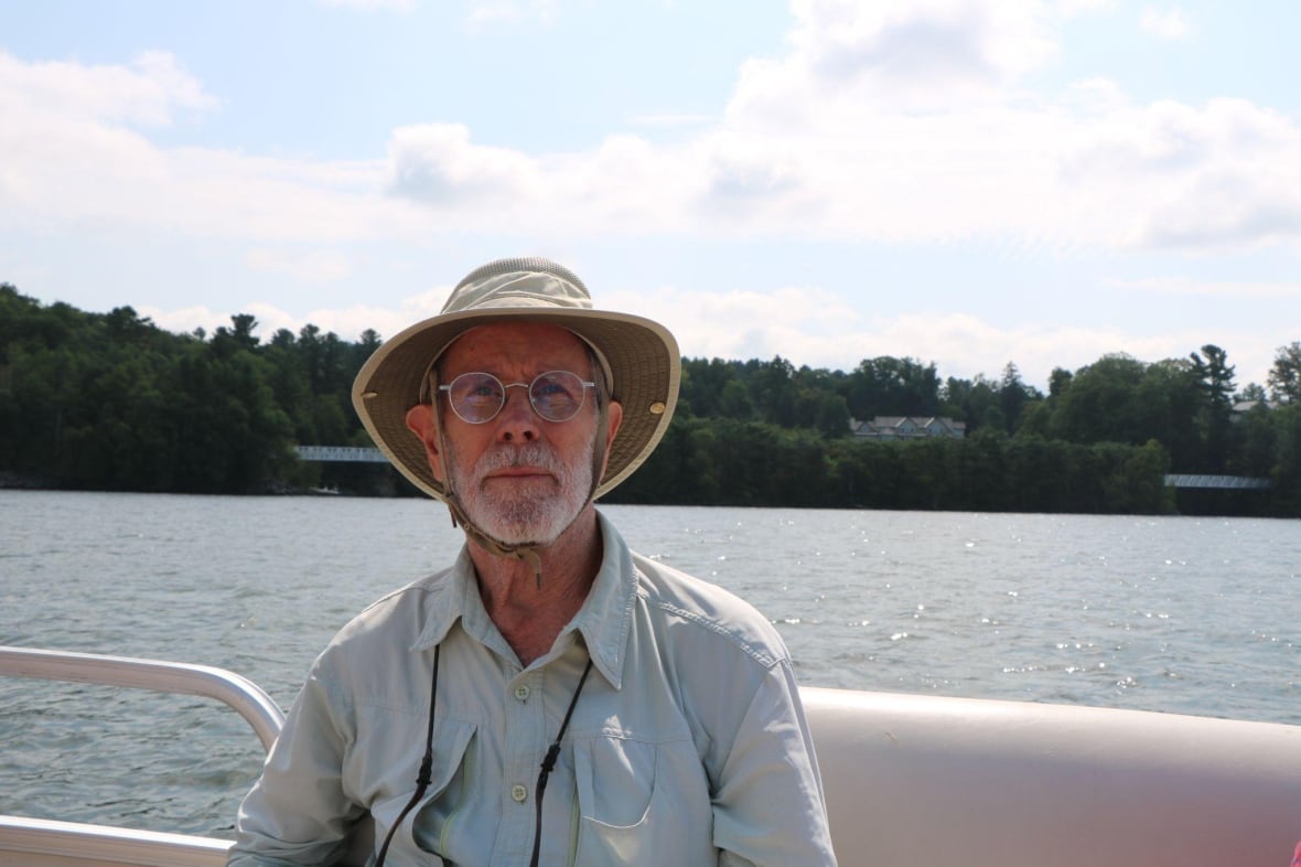 A man sitting on a boat. 