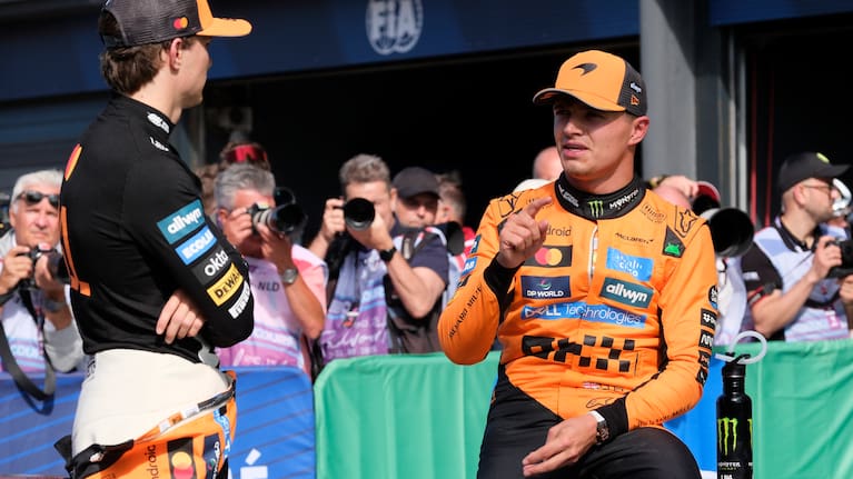 McLaren driver Lando Norris of Britain, right, talks to McLaren driver Oscar Piastri of Australia after the qualifying session ahead of the Formula One Dutch Grand Prix