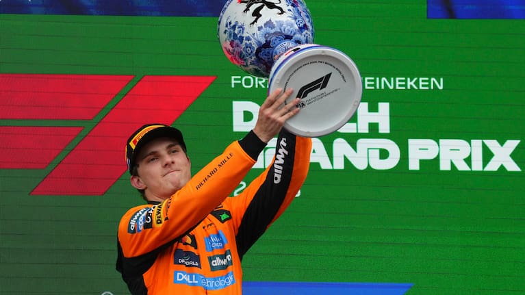 McLaren driver Oscar Piastri celebrates winning the Dutch GP