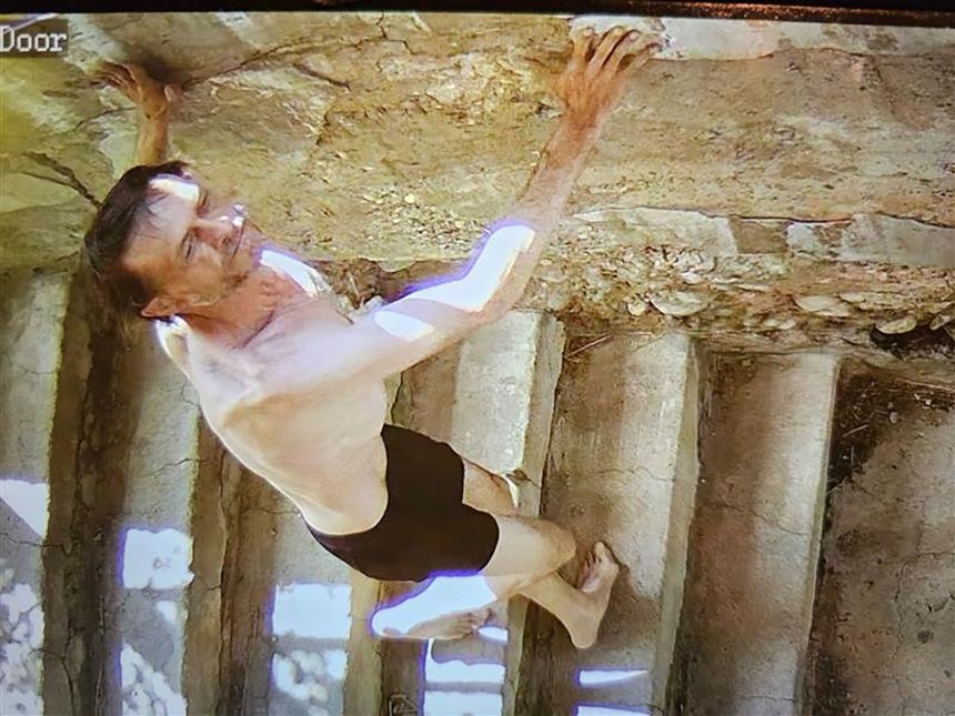 Security camera footage shows Michael Paul Brown fleeing Friday morning.