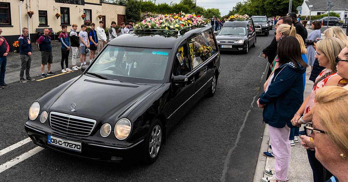 Murdered mother and children ‘together and finally safe’ – funeral hears