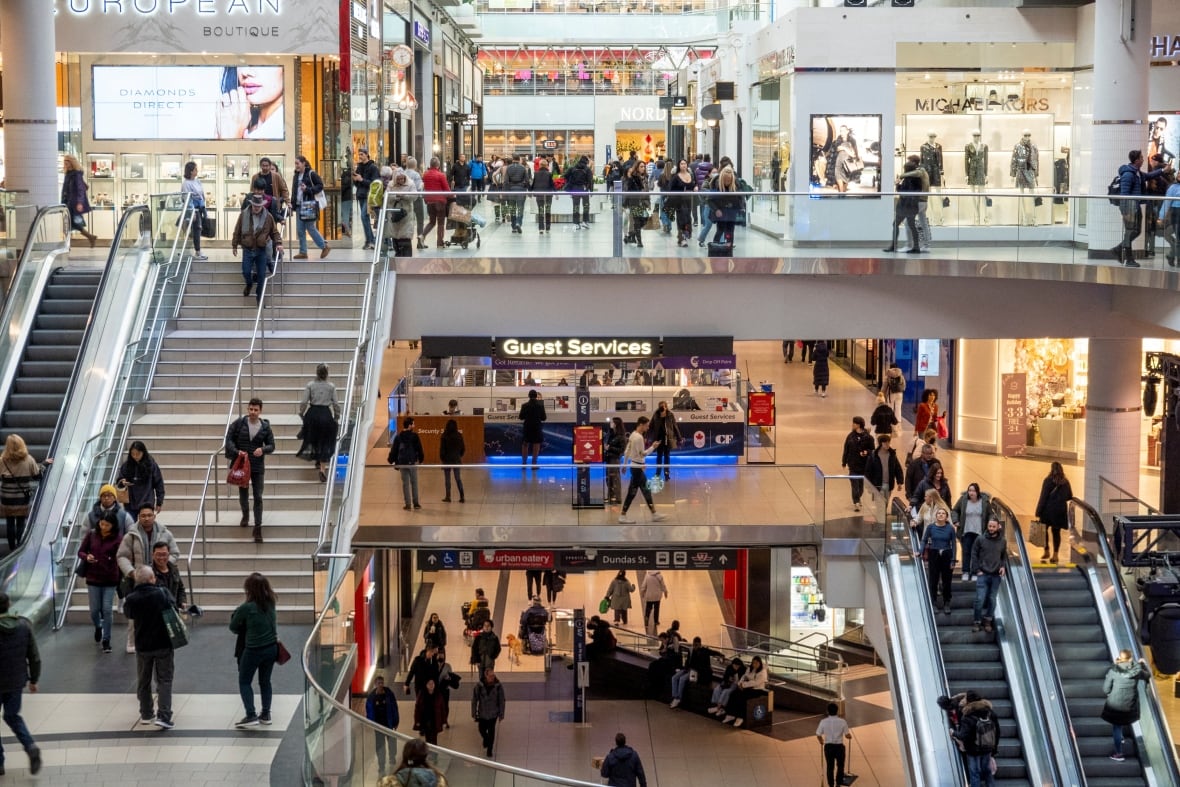 A view of a large number of shoppers at a Toronto mall.