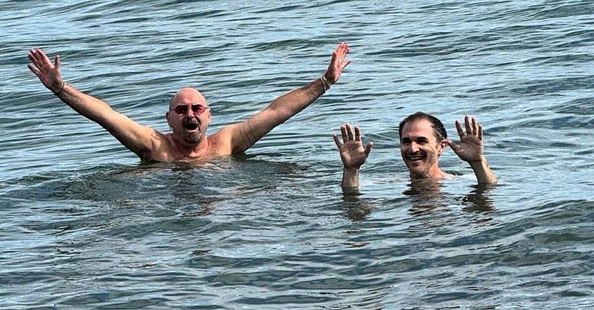 Oasis band members go swimming in Dublin