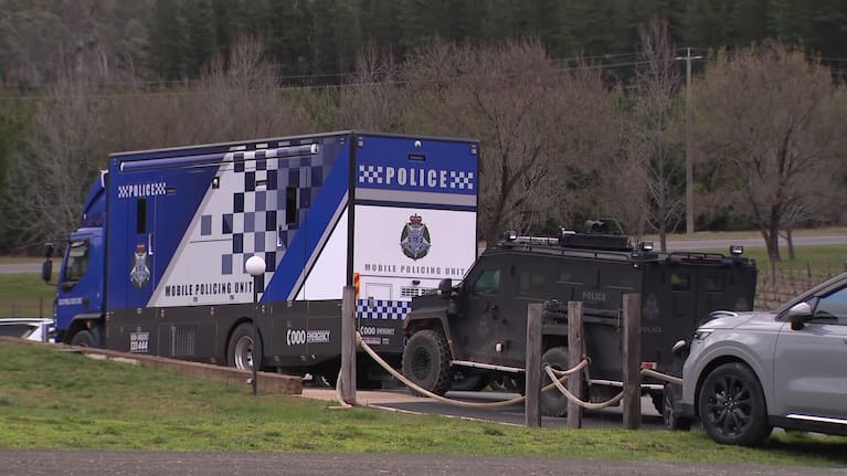 Police in Porepunkah while searching for the alleged gunman who ambushed a group of police officers, killing two. 