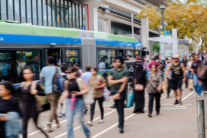Customers at Surrey Central in front of R1 RapidBus