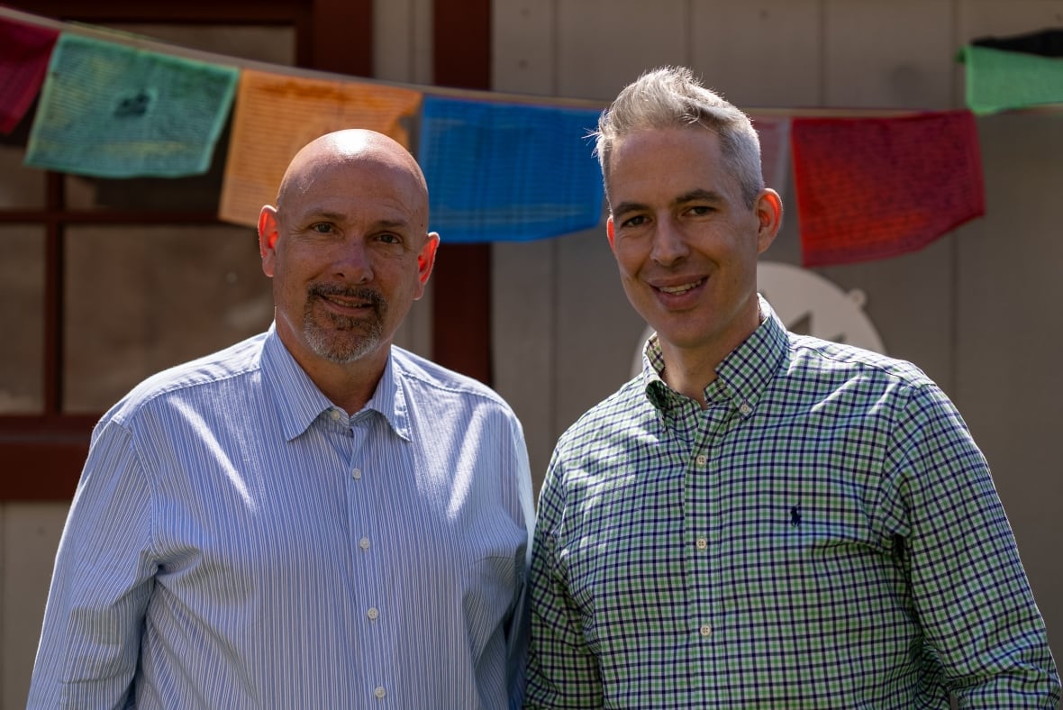 Robert Apgar-Taylor, left and his partner Rob felt increasingly unsafe in the United States and decided to make the move to Canada. But it hasn't been easy. Just one barrier they've faced: They can't buy a house because until they become citizens, they will have to pay a 25 per cent foreign buyers' tax in Ontario.