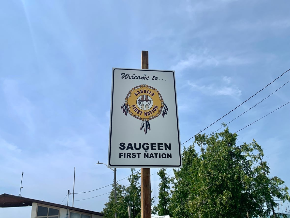 A sign in Sauble Beach, Ont. reads 'Welcome to Saugeen First Nation' as seen in July 2023. 