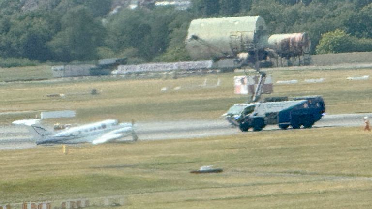 An aircraft on the runway at Birmingham airport seems to have emergency crews around it. Pic: @SpursSingh