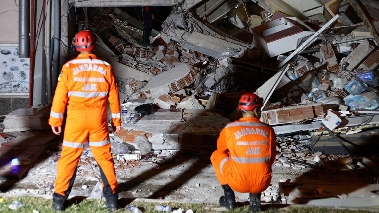 Search teams had to cope with several aftershocks overnight. Pic: Reuters