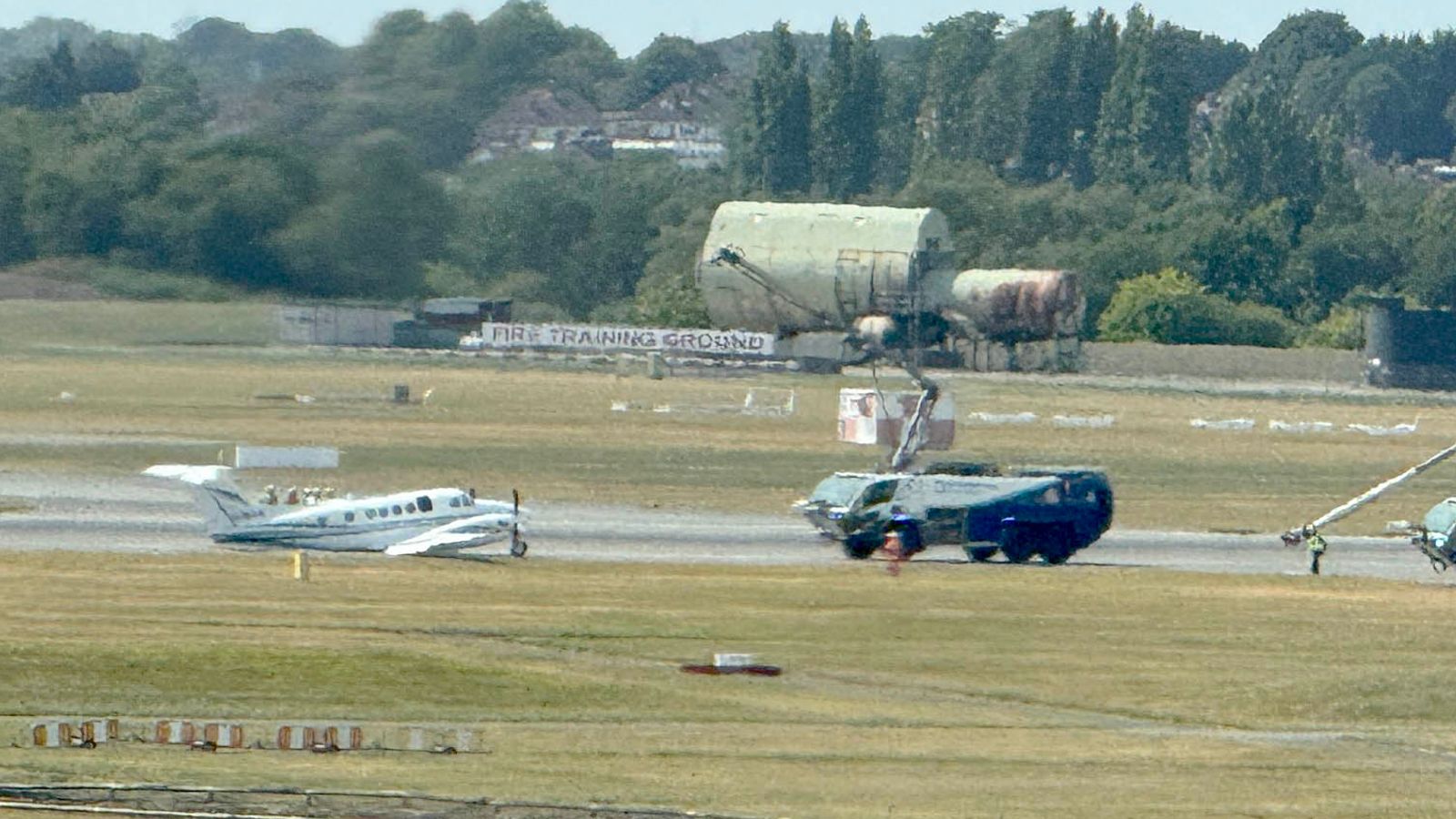 An aircraft on the runway at Birmingham airport seems to have emergency crews around it. Pic: @SpursSingh