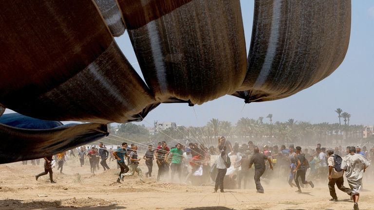 Aid dropped by air into Deir Al-Balah in Gaza. Pic: Reuters  