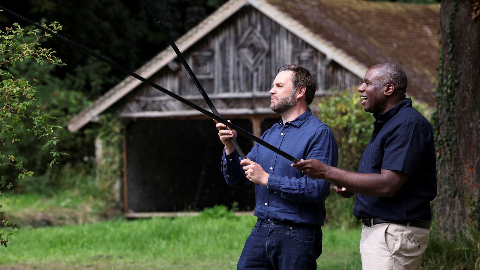David Lammy fishing with JD Vance in Kent on Friday. Pic: Reuters
