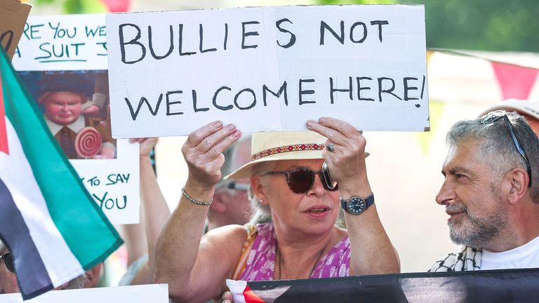 People attend the 'Vance not welcome party' protest as  JD Vance spends his holiday nearby. Pic: Reuters