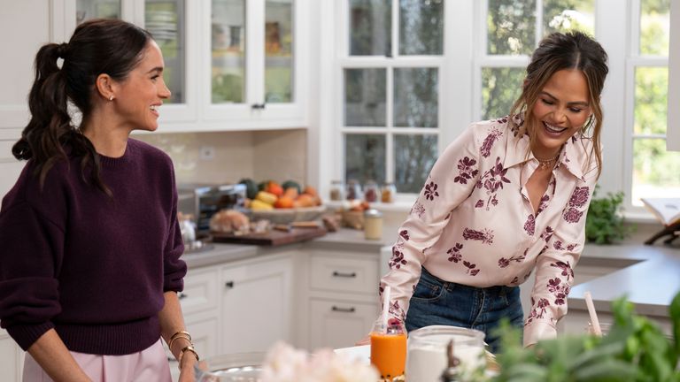 Meghan and Chrissy Teigen. Pic: Netflix/PA