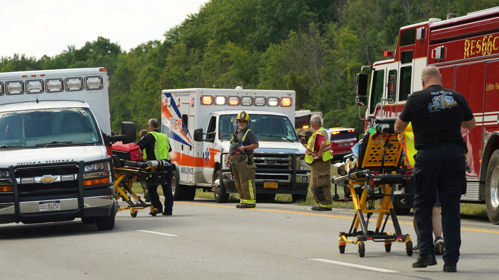 Rescue teams at the scene of a bus crash near Pembroke, New York State. Pic: Buffalo News/AP