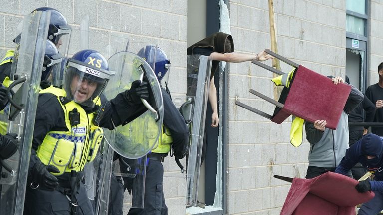 Trouble flares during a protest outside the Holiday Inn Express in Rotherham, South Yorkshire. Pic date: Sun August 4 2024