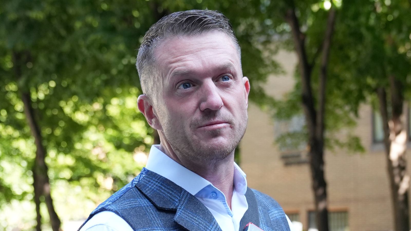 Tommy Robinson bailed after arrest over alleged assault at railway station | UK News